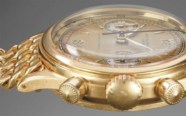 A very rare and attractive and historically important yellow gold chronograph wristwatch with two-tone dial and tachymeter scale, retailed by Beyer-Zürich